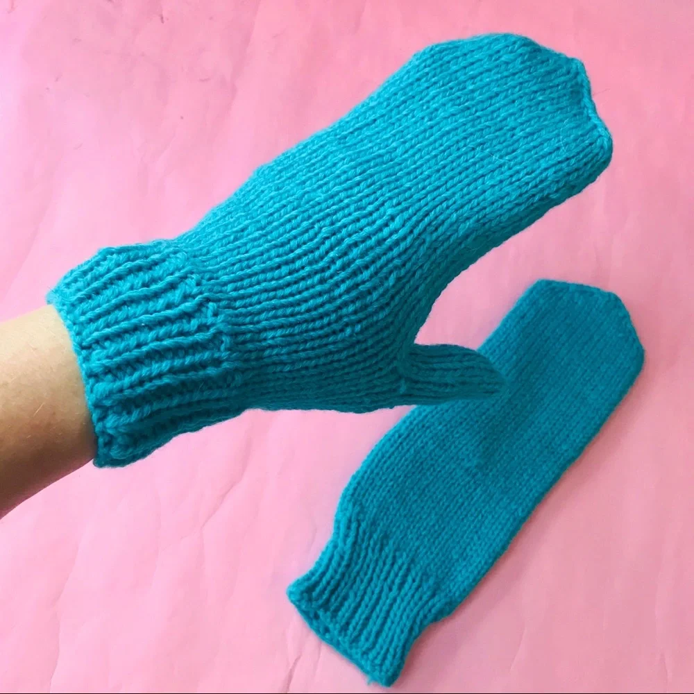 New turquoise hand knitted wool mittens
